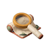 Clay magnifying glass on a scroll